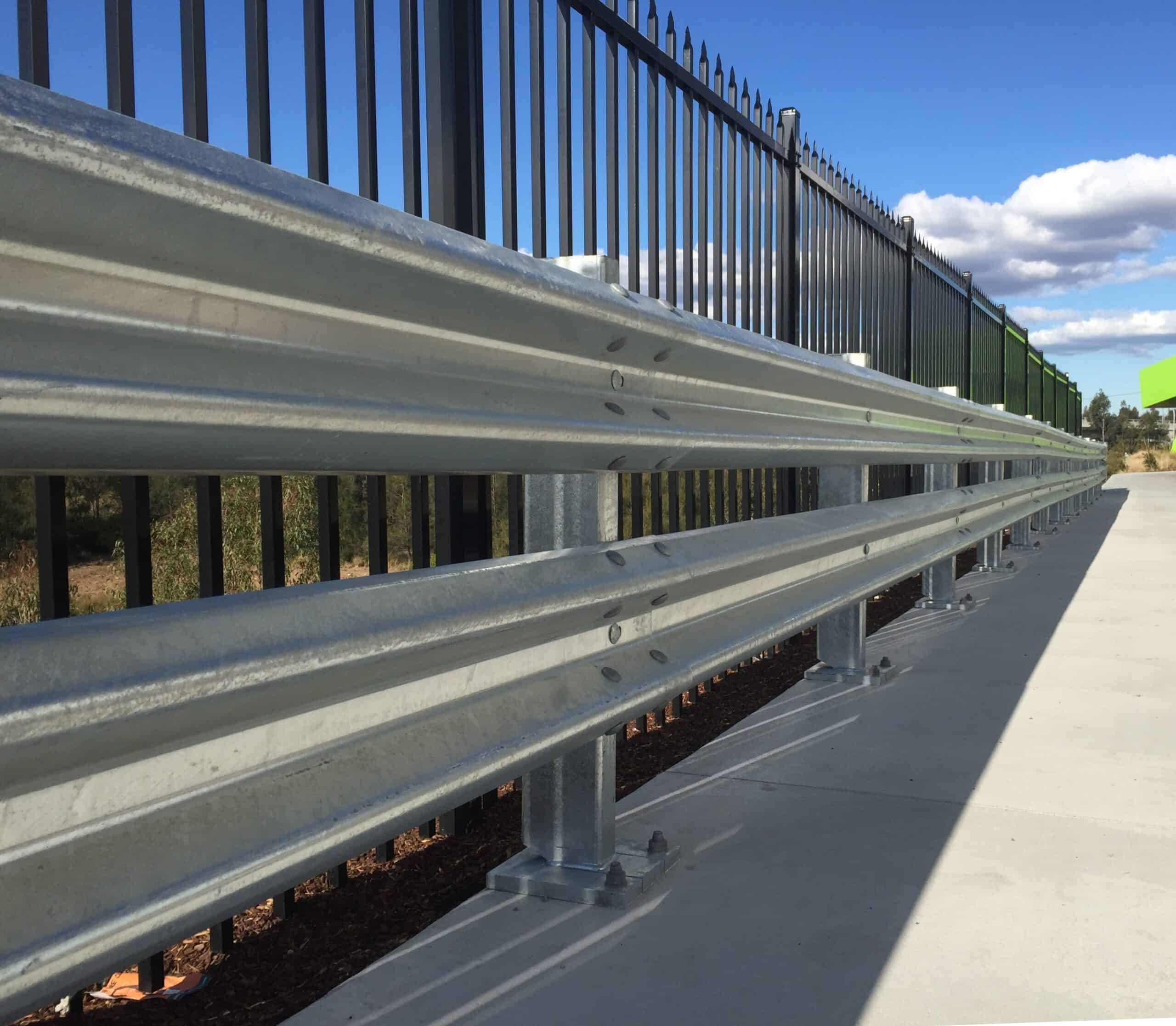 RhinoStop TruckGuard twin w-beam barrier at a loading dock