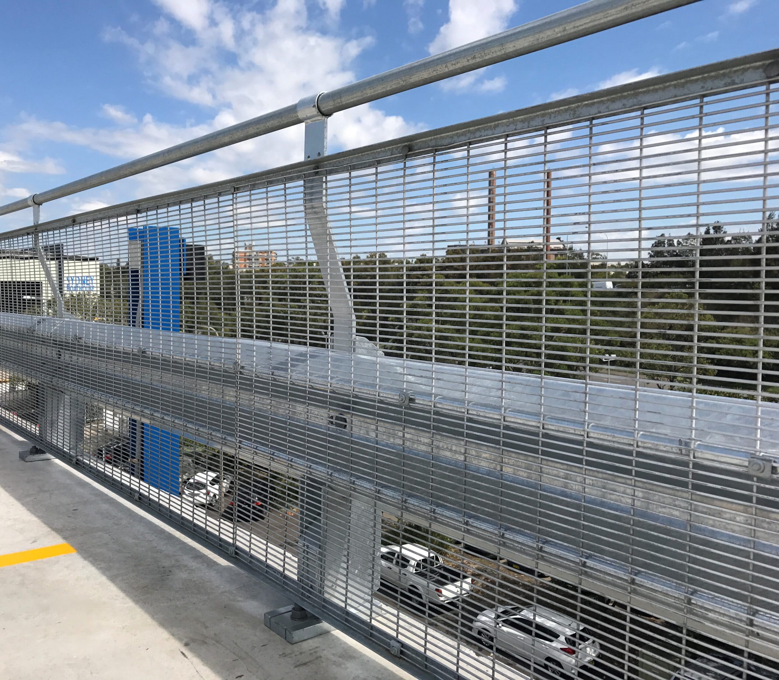 RhinoStop Standard w-beam guardrail barrier installed in a car park